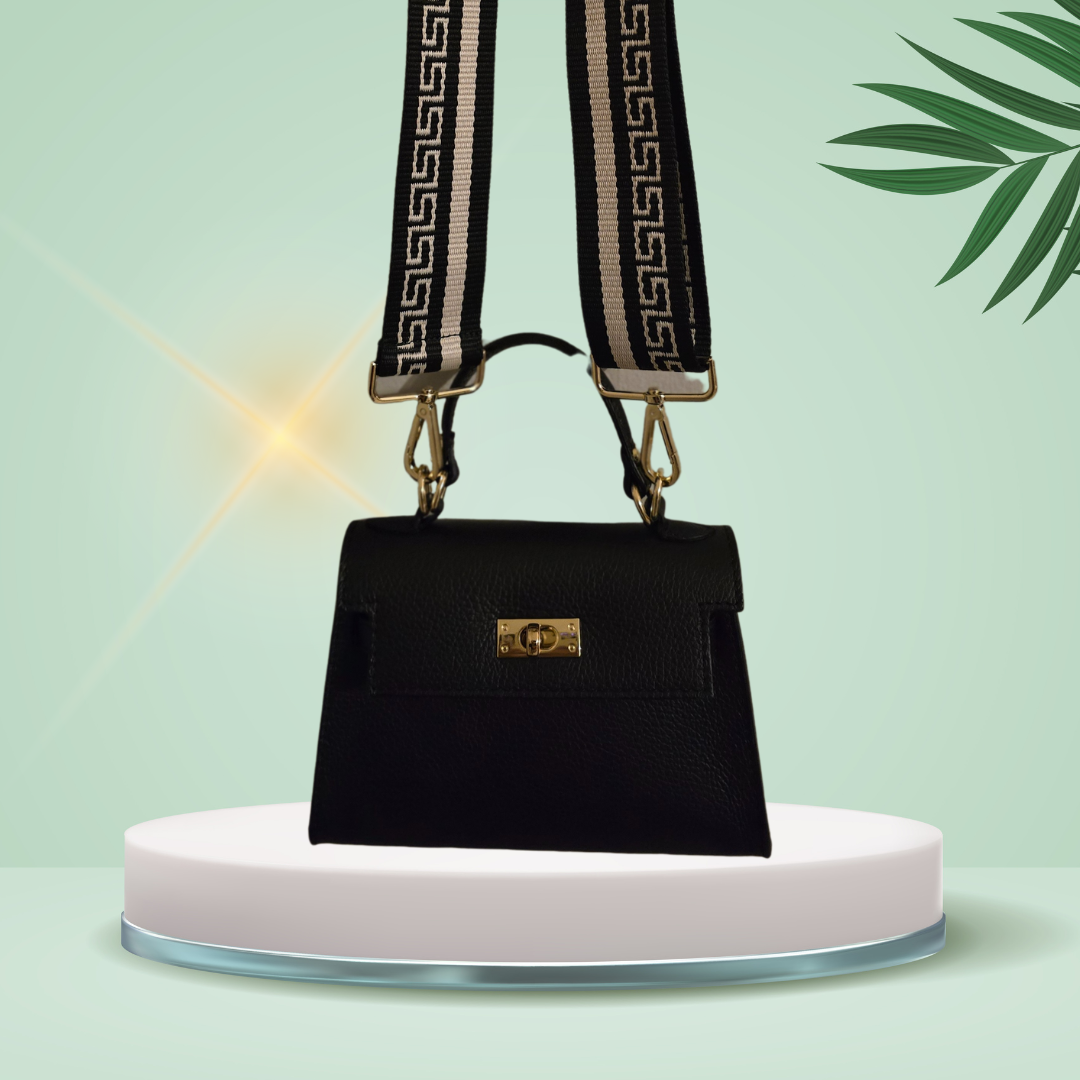 Zwarte leren Crossbody handtas met goudkleurige draaisluiting.