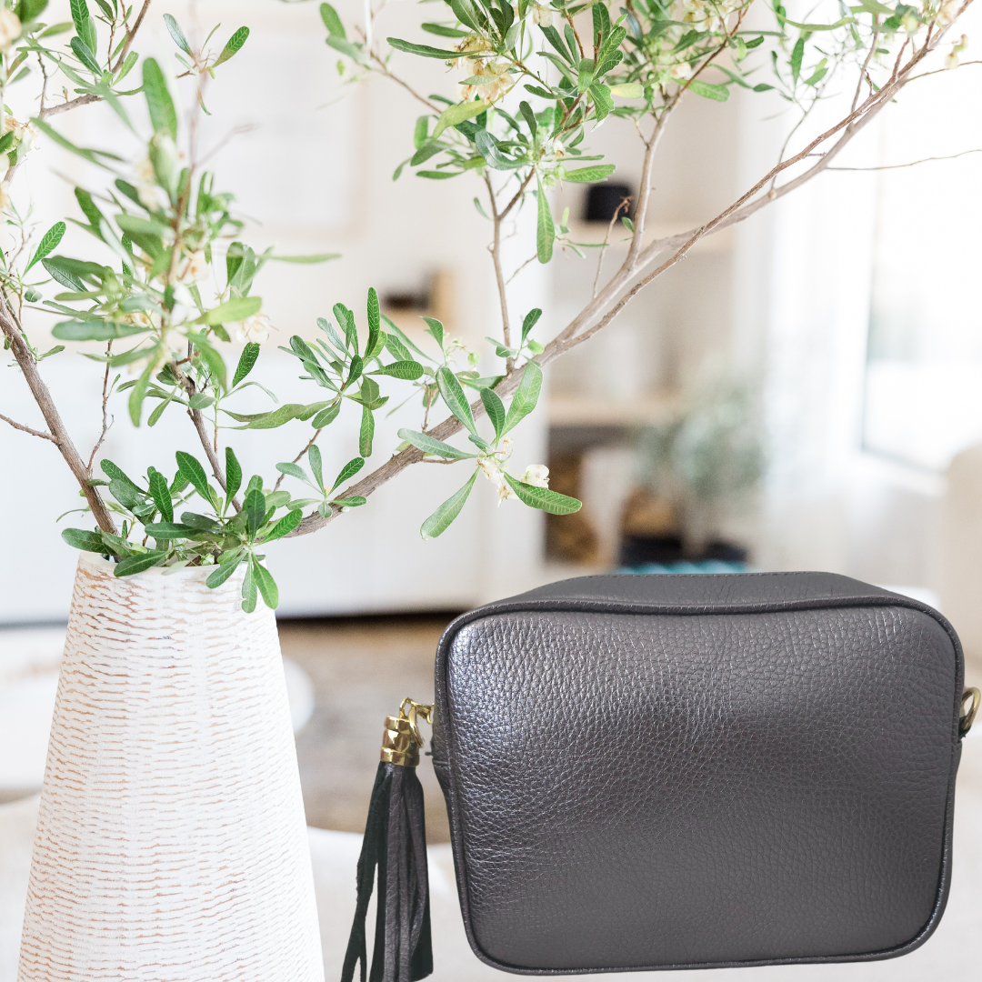 Handtas met gouden ritssluiting