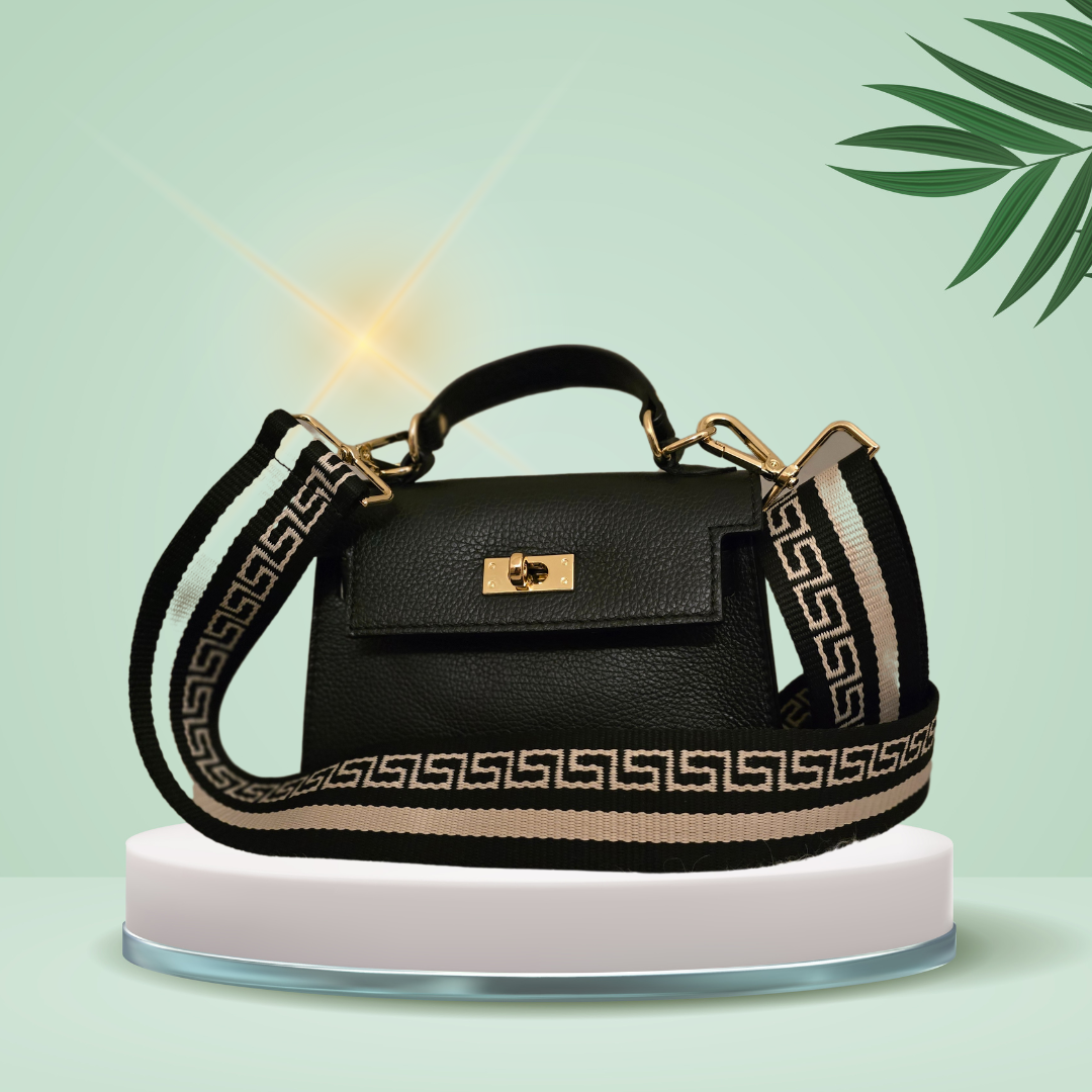 Zwarte leren Crossbody handtas met goudkleurige draaisluiting.