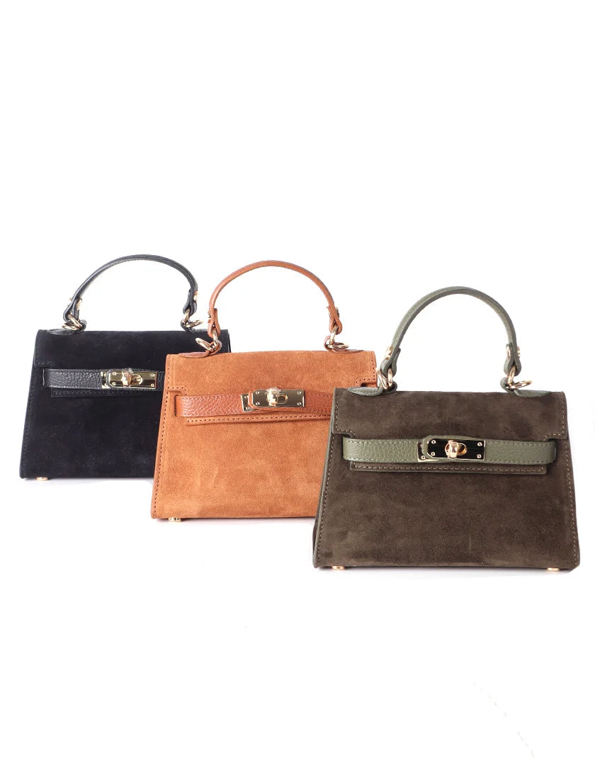 Chique suède handtas van echt leer met goudkleurige draaisluiting