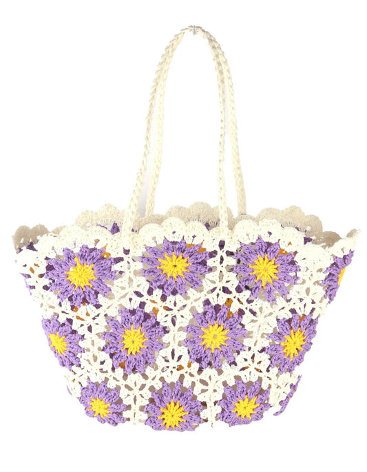 Strandtas met een bloemen print.