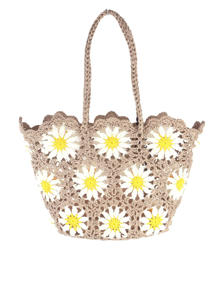 Strandtas met een bloemen print.