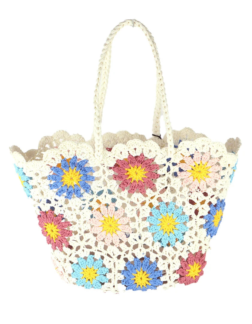 Strandtas met een bloemen print.