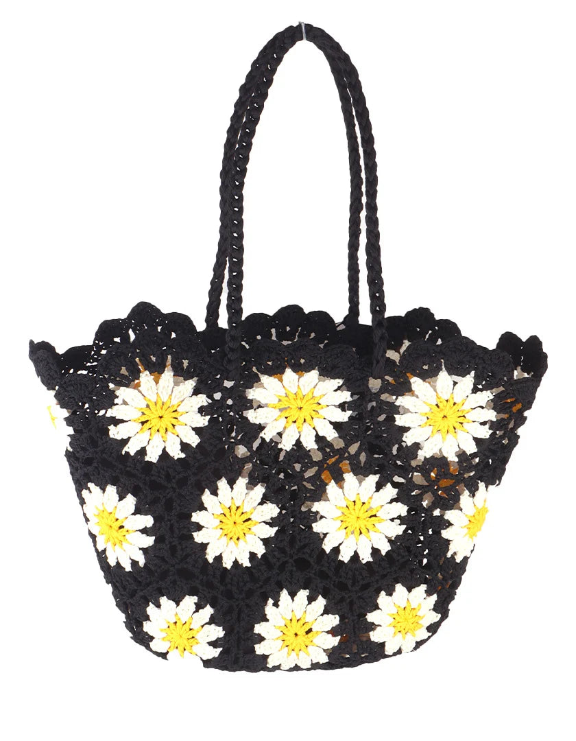 Strandtas met een bloemen print.