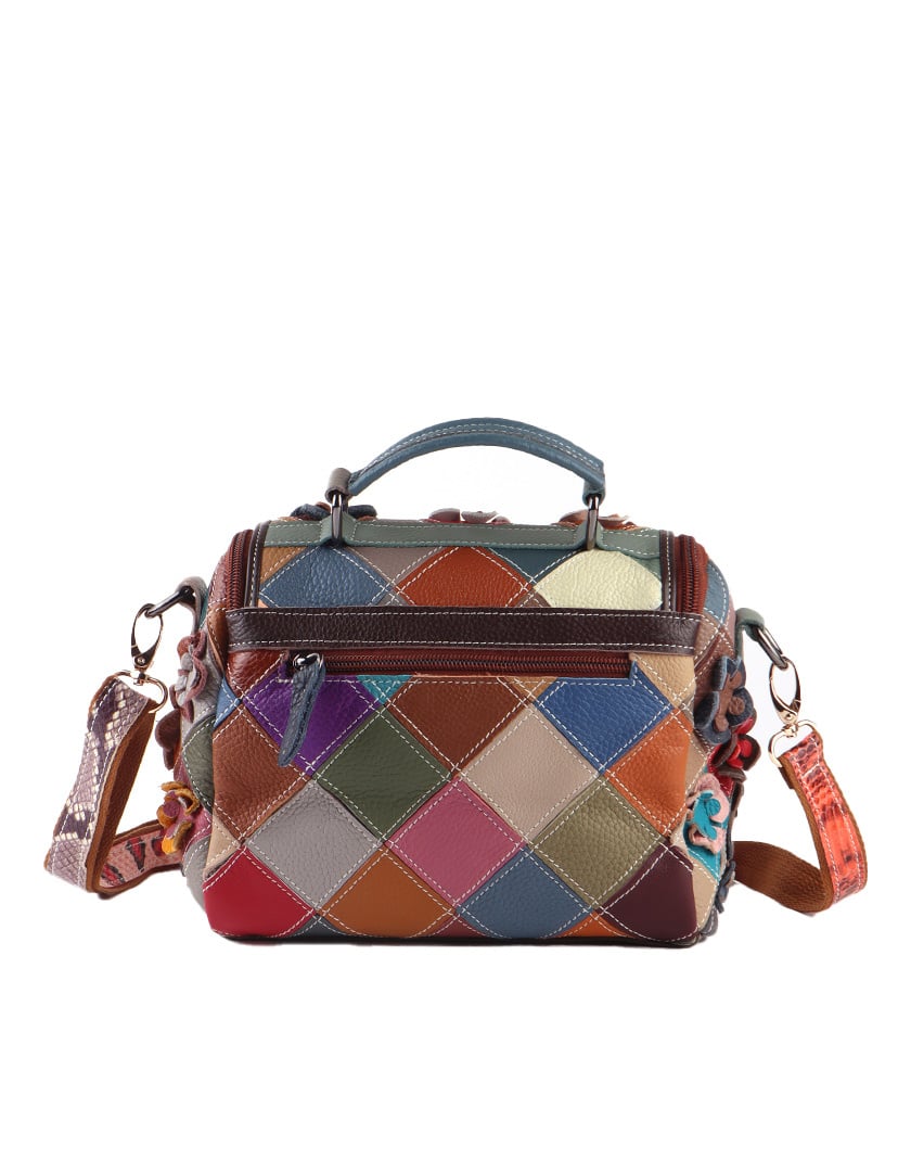 Lederen bloemetjes handtasje met een ronde rits aan de voorkant voor het hoofdvak.